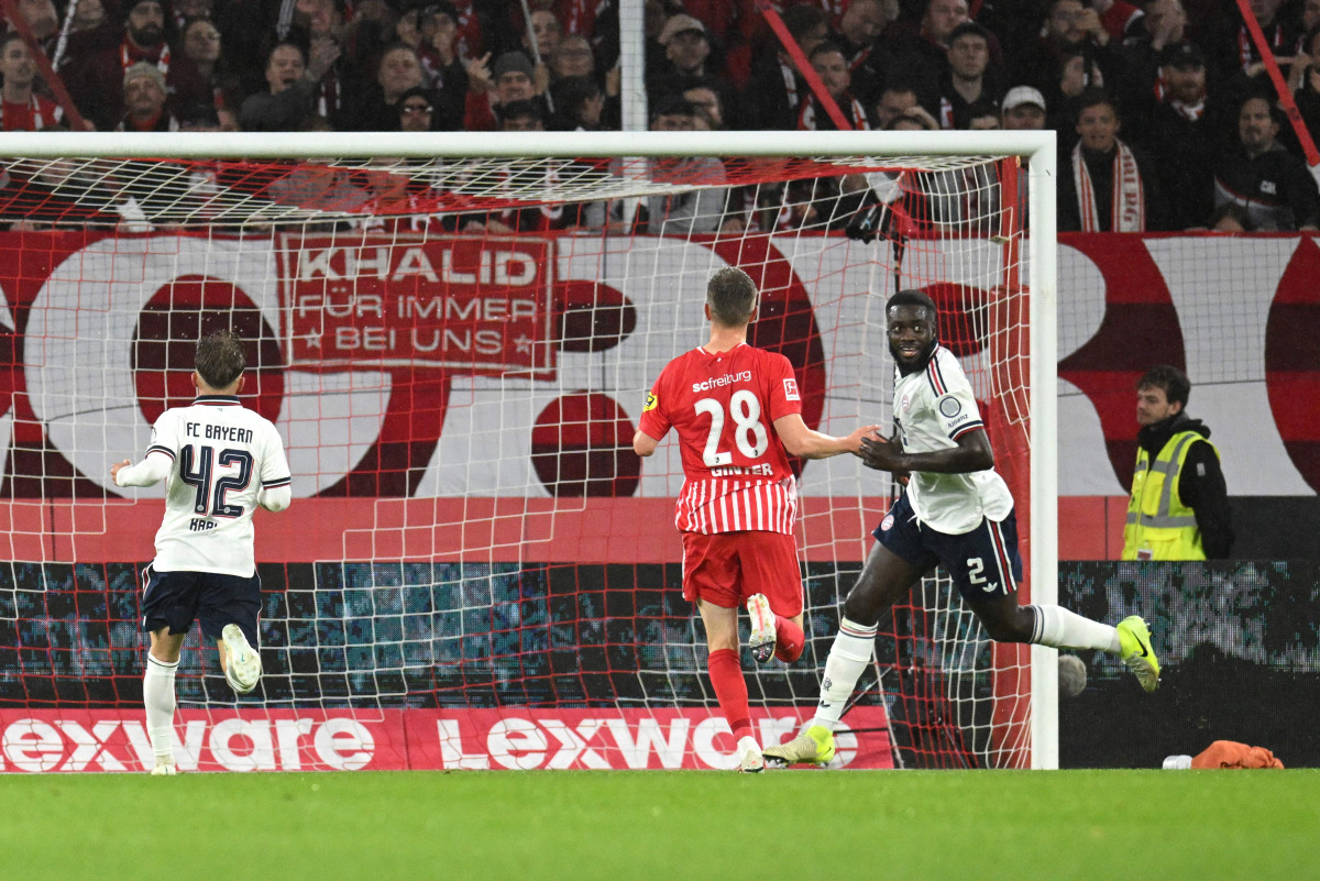 Bayern Munich’s Dayot Upamecano (right) celebrates after scoring the first gaol against Freiburg. 