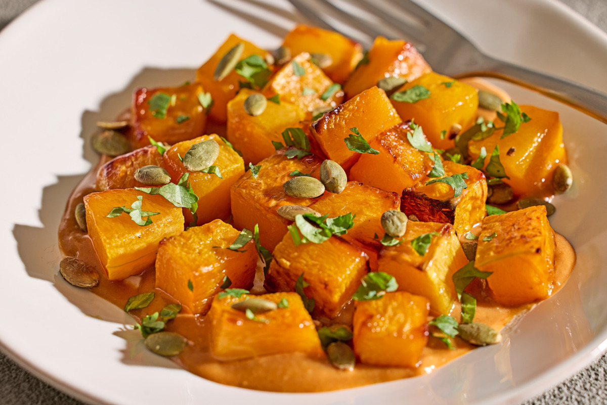 Honey-Roasted Squash With Spicy Peanut Sauce. (Tom McCorkle/For The Washington Post; food styling by Gina Nistico)
