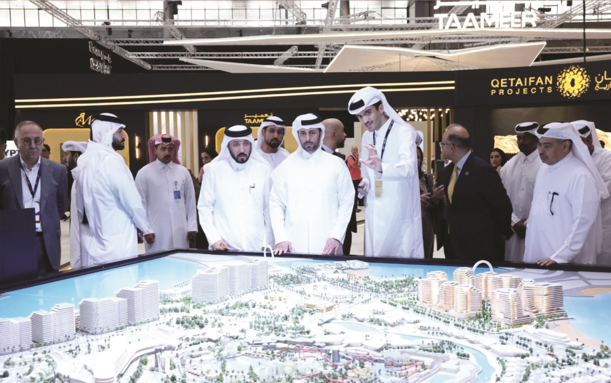 Minister of Municipality H E Abdullah bin Hamad bin Abdullah Al-Attiyah, Minister of Finance H E Ali bin Ahmed Al-Kuwari with other dignitaries touring one of the exhibition pavilions yesterday.