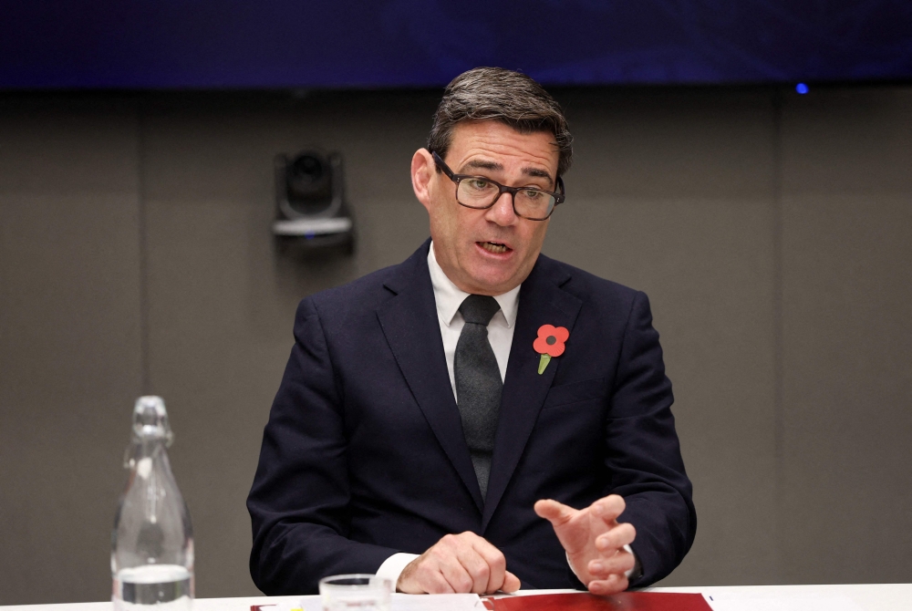 Britain's Prime Minister Andy Burnham chairs a meeting of the National Economic Council in Glasgow on October 30, 2026, that focuses on driving growth in every region of the United Kingdom. (Photo by Russell Cheyne / POOL / AFP)